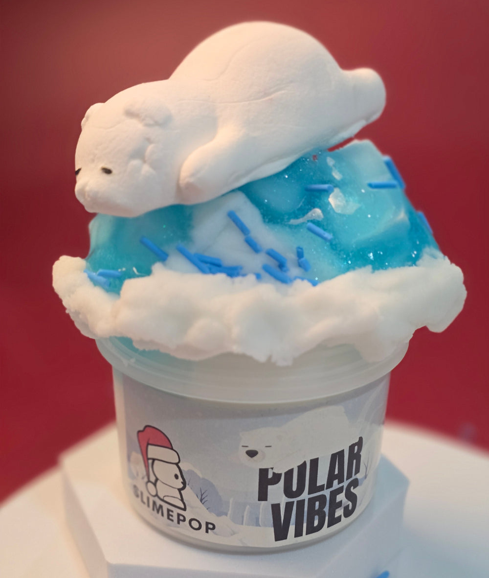 A container of blue and white cloud-shaped slime with a label that reads 'Polar Vibes'.