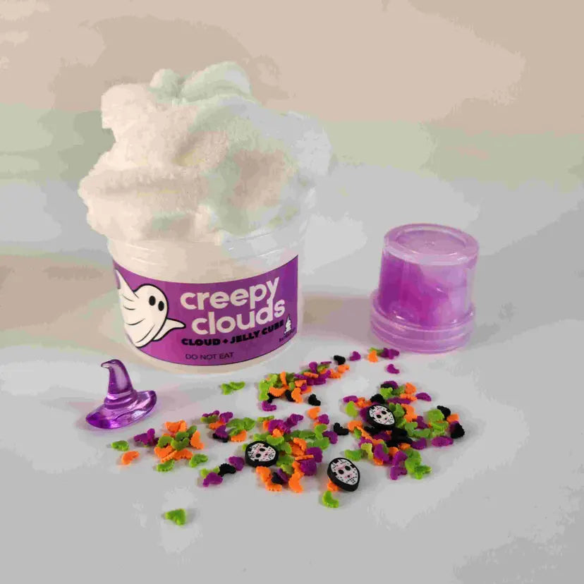 Container of 'creepy clouds' with Halloween-themed sprinkles on a light background