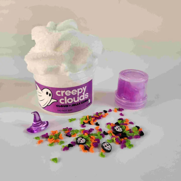 Container of 'creepy clouds' with Halloween-themed sprinkles on a light background