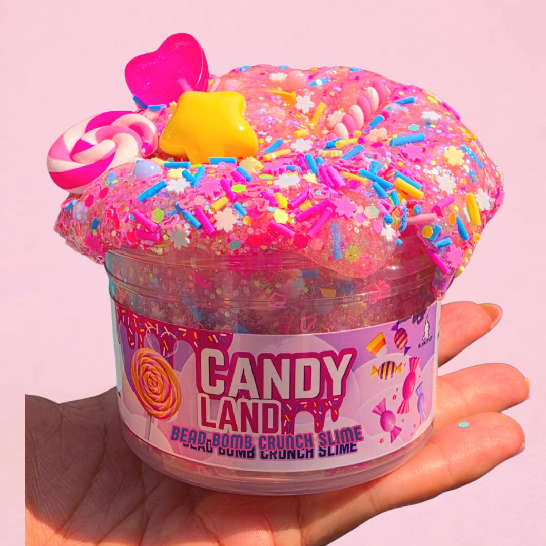 Candy Land pink clear slime being stretched and squeezed, revealing colorful crunchy beads, candy charms, glitter and sprinkles