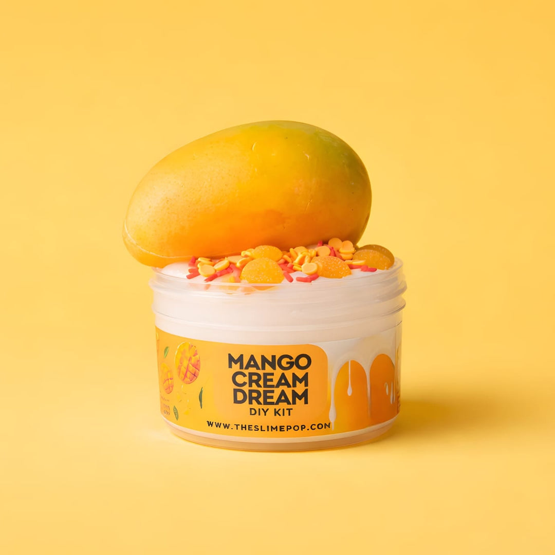 A high-angle product shot of Slimepop Mango-themed DIY kit  featuring a thick and glossy cream-colored slime base in a clear jar with a realistic handmade mango-shaped clay piece on top

