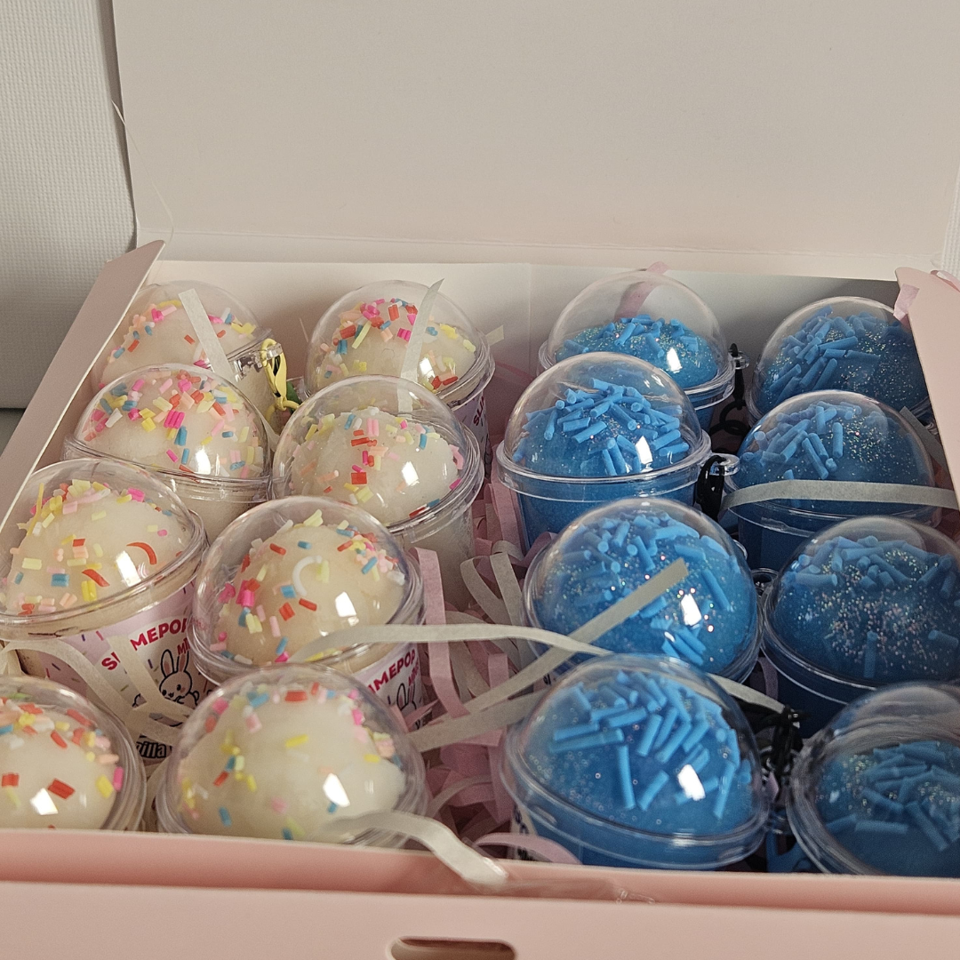 Assorted small containers with colorful slime good for slime party favors